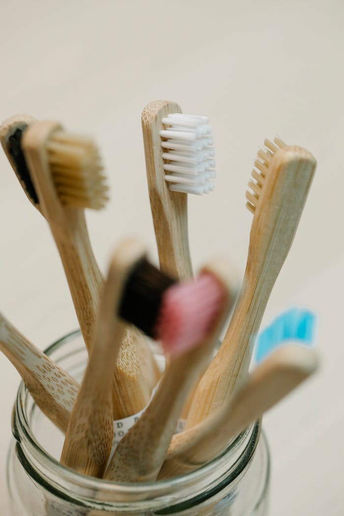 Sustainable bamboo toothbrushes with colorful bristles for eco-conscious oral hygiene.